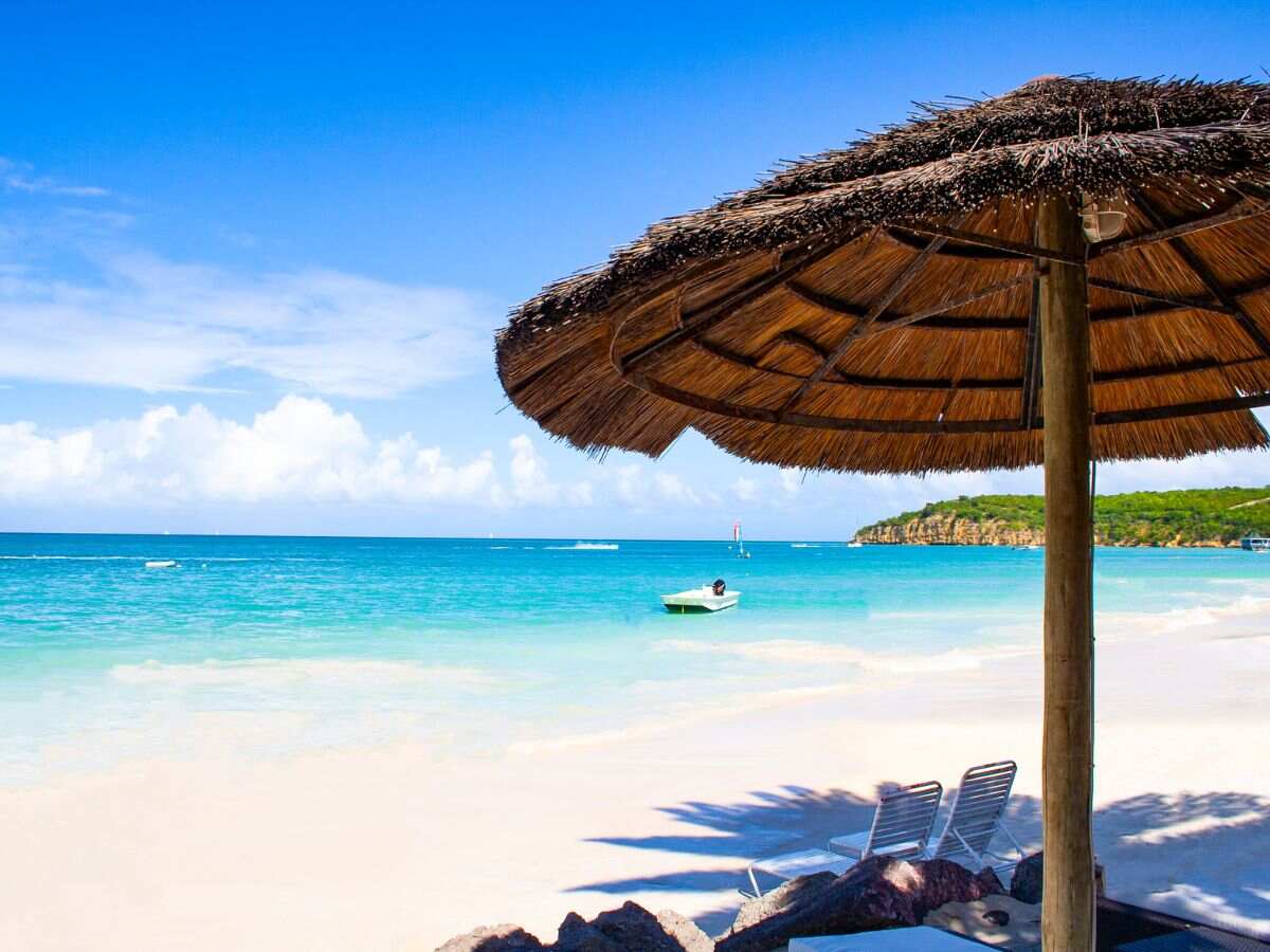 white sandy beach with crystal clear beach on a sunny day
